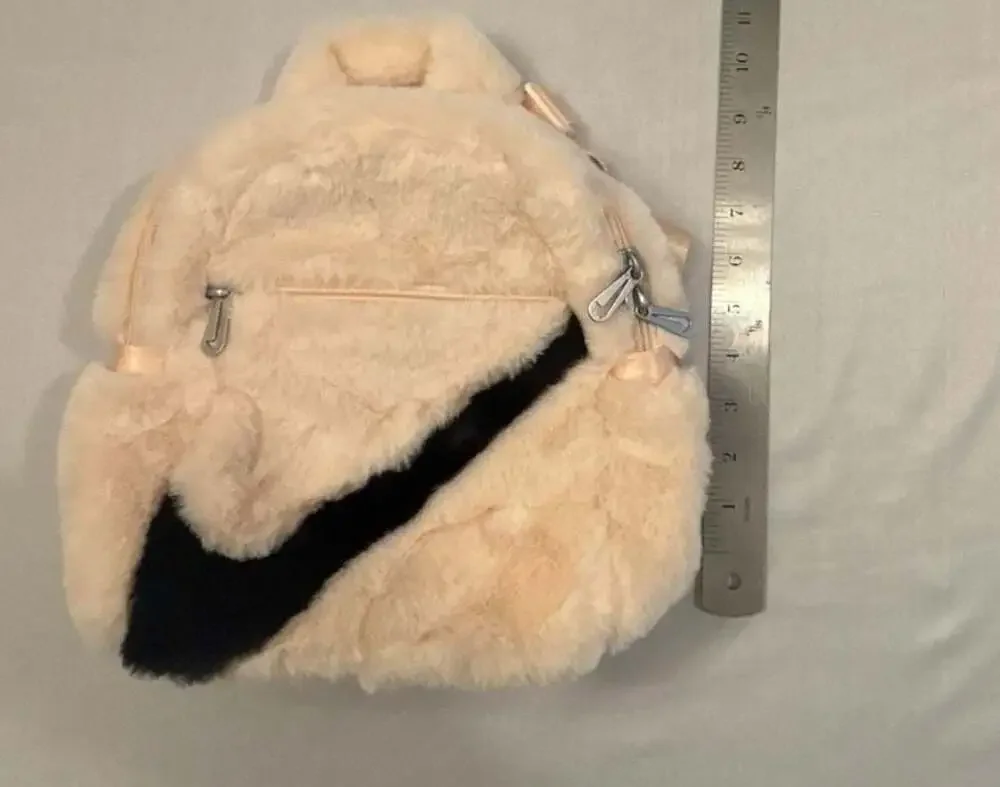 Nike 365 Faux Fur Mini Backpack in Peach/Cream with Black Swoosh